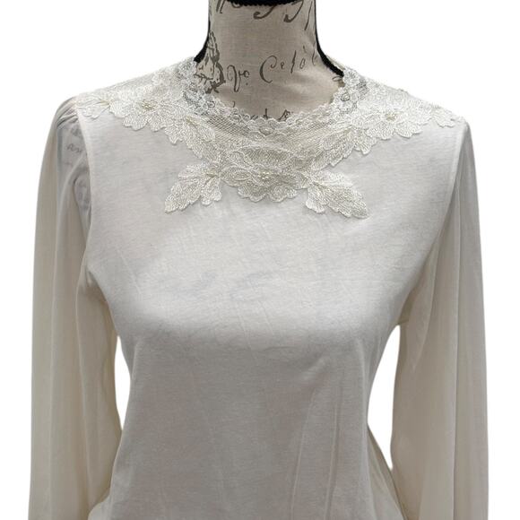 Anthropologie Tiny Long-Sleeve
Mock-Neck Lace Embellished Top - Picture 8 of 9
